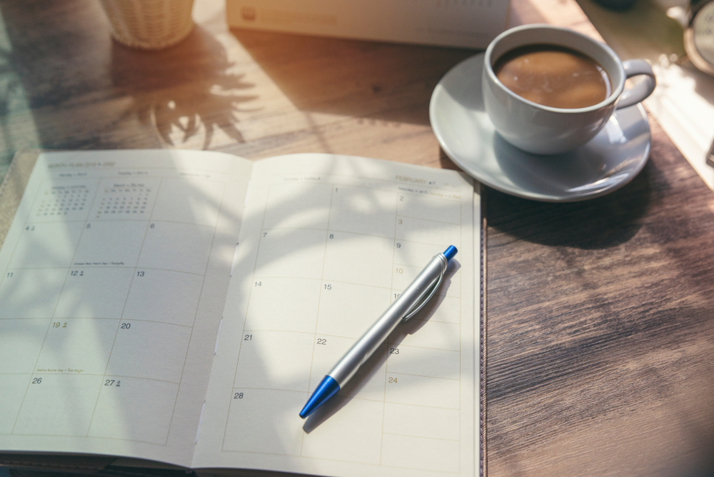 Daily Planner and a Cup of Coffee