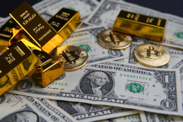 Gold bars and american one dollar bills.