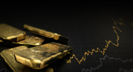 3D illustration of gold ingots over black background with a chart.
